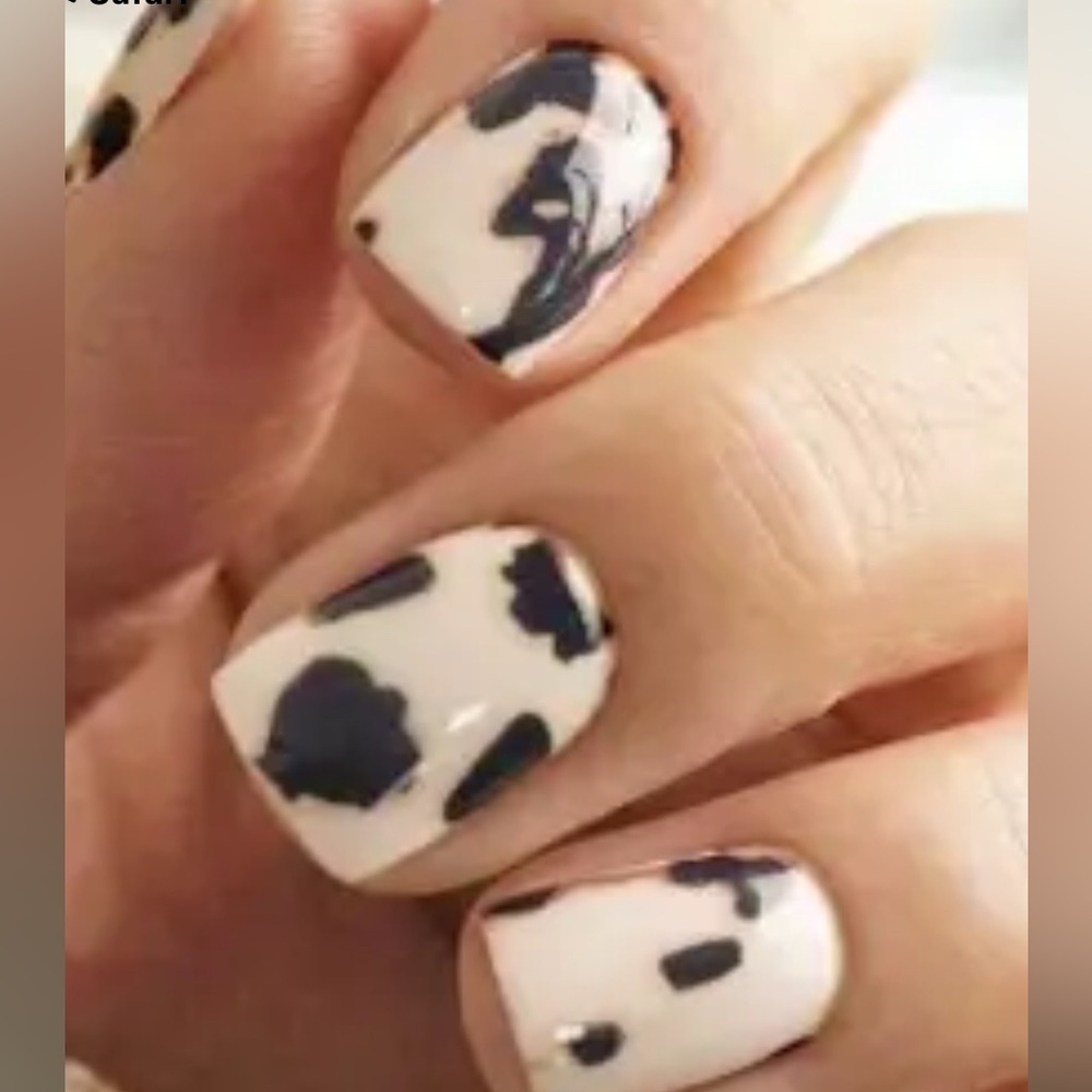 Chic Black and Cream Nail Art